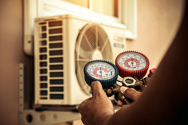 Professional Air Conditioning Service technician working in Clayville, NY